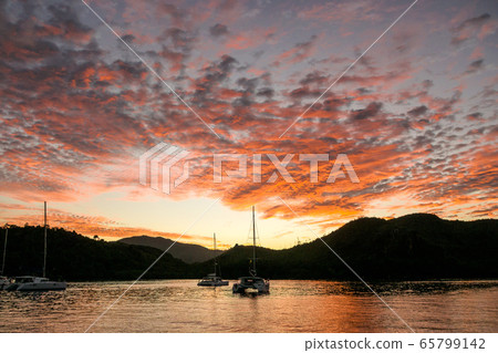 Sunset at Tropical island Curieuse at Seychelles, Sunset at Tropical island Curieuse at Seychelles, 65799142