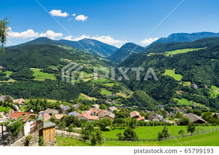 Overlooking the Eisack valley with the villages on Overlooking the Eisack valley with the villages on 65799193