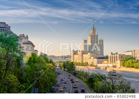 View of Kosmodamianskaya embankment and the House on Kotelnicheskaya embankment in spring evening 65802498