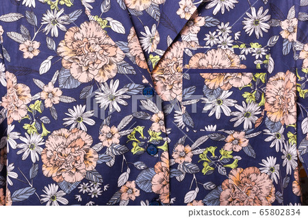 Close-up detail and fabric texture of a pajama. Homewear, sleepwear, shopping and sale concept. Close-up detail and fabric texture of a pajama. Homewear, sleepwear, shopping and sale concept. 65802834