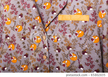 Close-up detail and fabric texture of a pajama. Homewear, sleepwear, shopping and sale concept. 65802835