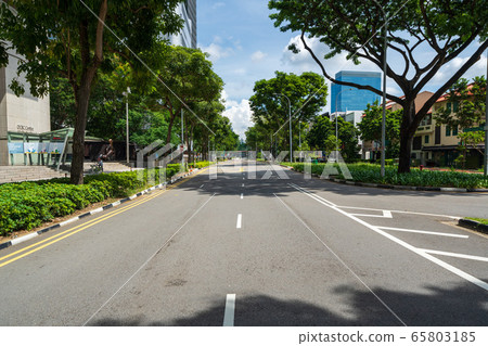 A street in Singapore with less traffic due to the new coronavirus epidemic A street in Singapore with less traffic due to the new coronavirus epidemic 65803185