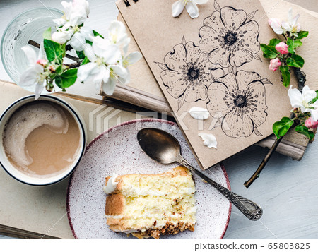 Cup of coffee and a beautiful drawing 65803825