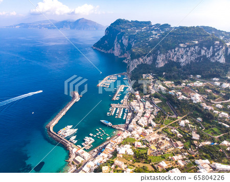 Aerial drone view of Capri island. Sunny summer day. Italy Aerial drone view of Capri island. Sunny summer day. Italy 65804226