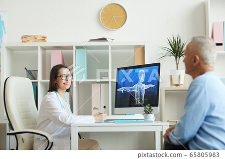 Female Doctor Talking to Senior Man in Modern Clinic Interior Female Doctor Talking to Senior Man in Modern Clinic Interior 65805983