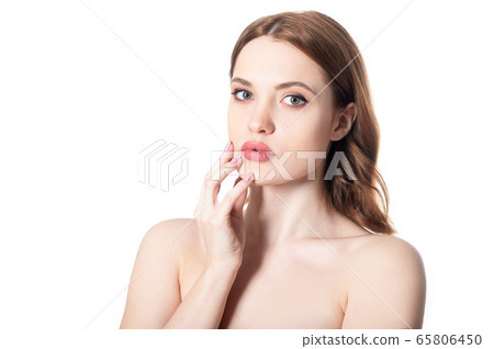 Beautiful young woman with perfect skin isolated on white background Beautiful young woman with perfect skin isolated on white background 65806450