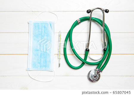 Top view of stethoscope, protective mask and Top view of stethoscope, protective mask and 65807045