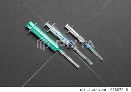 Top view of medical syringes on colorful Top view of medical syringes on colorful 65807046