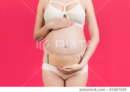 Close up of elastic maternity band dressed on Close up of elastic maternity band dressed on 65807085