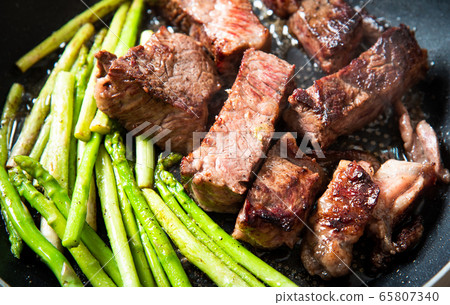 Wagyu Japanese beef steak frying on the pan 65807340