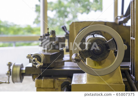 Machine work shop with grinder machine and bench Machine work shop with grinder machine and bench 65807375