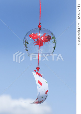 Goldfish wind chimes swaying against the blue sky 65807615
