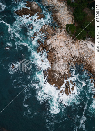 Lone Cypress tree scenic aerial view along famous 17 Mile Drive road in Monterey. 65808165