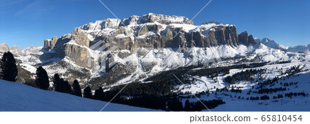 Italy Dolomites Winter Mountains Landscape Wolkenstein sella stock sella ronda panorama Italy Dolomites Winter Mountains Landscape Wolkenstein sella stock sella ronda panorama 65810454