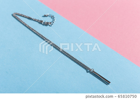 Top view of fashion jewelry and accessories on bright color background. Luxurious jewelry bijouterie and trendy concept. 65810750