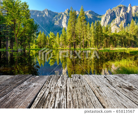 Cathedral Rocks reflecting in Merced River at Cathedral Rocks reflecting in Merced River at 65813567