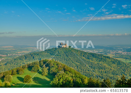 Hilltop Hohenzollern Castle on mountain top in Hilltop Hohenzollern Castle on mountain top in 65813578