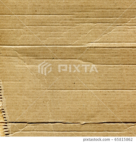 Closeup of brown cardboard texture. Dark rough vintage paper. Closeup of brown cardboard texture. Dark rough vintage paper. 65815862