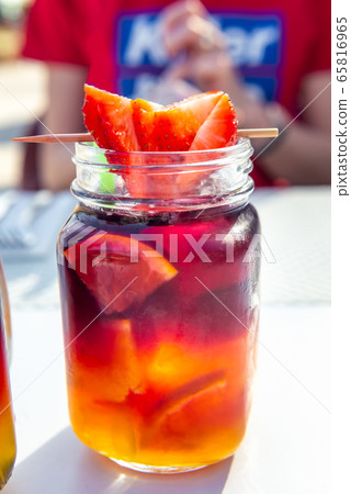 Cold sangria or punch with fruits Cold sangria or punch with fruits 65816965