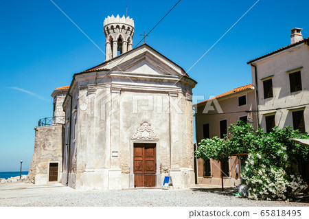 Old town lighthouse and old church in Piran, Slovenia Old town lighthouse and old church in Piran, Slovenia 65818495