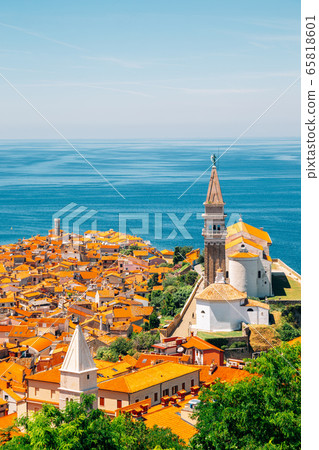 Panoramic view of Piran old town and Adriatic sea with St. George's Parish Church in Slovenia Panoramic view of Piran old town and Adriatic sea with St. George's Parish Church in Slovenia 65818601