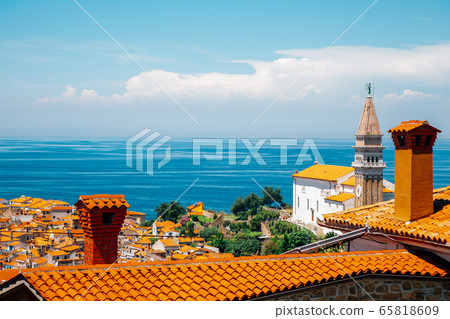 St. George's Parish Church and old town and Adriatic sea panorama view in Piran, Slovenia St. George's Parish Church and old town and Adriatic sea panorama view in Piran, Slovenia 65818609