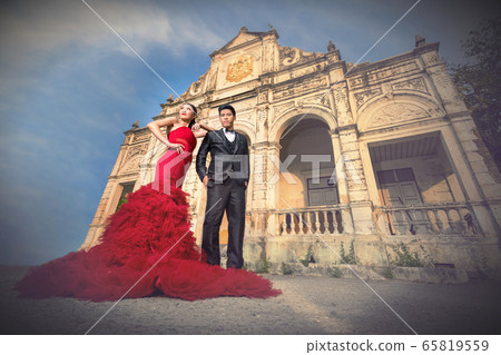 Man and Beautyful woman wearing fashionable red Man and Beautyful woman wearing fashionable red 65819559