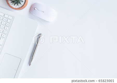 White desk office with laptop, smartphone and 65823001