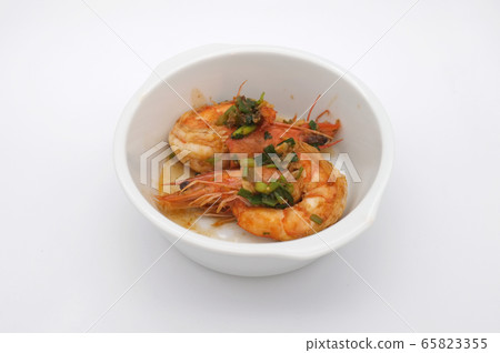 Fried shrimp with garlic on white background Fried shrimp with garlic on white background 65823355
