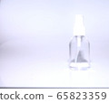 clear little white spray bottle , on white background empty copy space 65823359