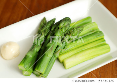 Boiled asparagus and mayonnaise Boiled asparagus and mayonnaise 65830420