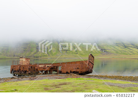 Shipwreck from Mjoifjordur fiord, east Iceland. Shipwreck from Mjoifjordur fiord, east Iceland. 65832217