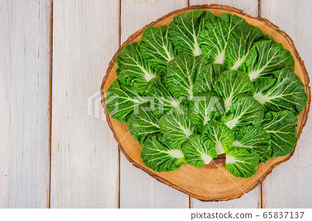 Spring vegetables and herbs, close up of nutritious greens sprouting in spring. 096 65837137