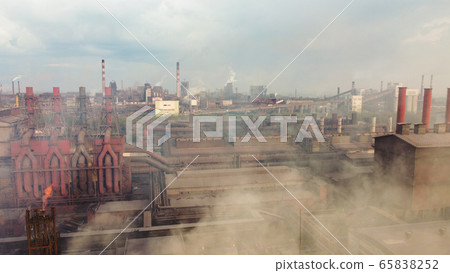 Panoramic view of heavy industry with detrimental impact on nature. CO2 emissions, toxic poisonous gases from chimneys. dirty pipelines and clouds of smoke 65838252