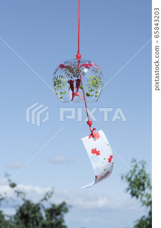 Goldfish wind chimes swaying against the blue sky Goldfish wind chimes swaying against the blue sky 65843203