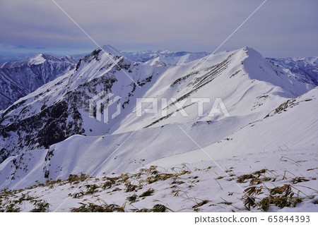 Ridge line of Mt. Tanigawa towards Sennokurayama Ridge line of Mt. Tanigawa towards Sennokurayama 65844393