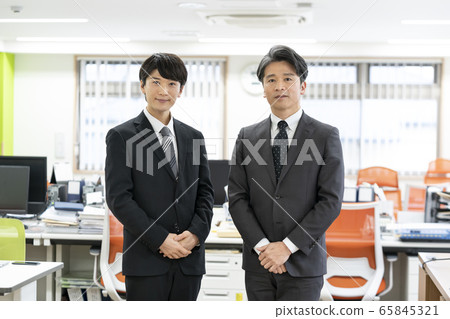 Businessman young and veteran image 65845321