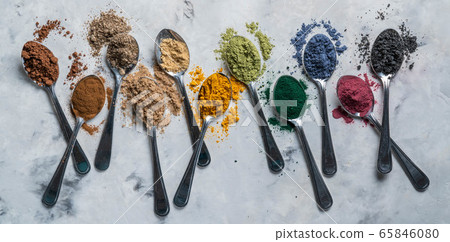 Super powders in spoons - matcha, turmeric, ginger, cocoa, spirulina, chia, cinnamon, black sesame 65846080