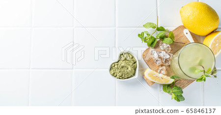 Green matcha lemonade on white background Green matcha lemonade on white background 65846137