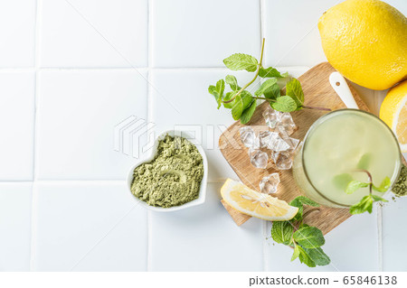 Green matcha lemonade on white background Green matcha lemonade on white background 65846138