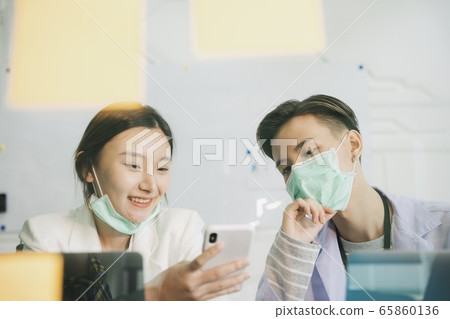 Doctor and nurse in lunch time. Doctor and nurse in lunch time. 65860136
