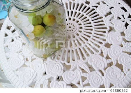 Bottled sugar plum making Ume sugar plum material background Bottled sugar plum making Ume sugar plum material background 65860552