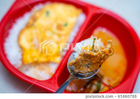 pork panaeng curry with rice and omelet pork panaeng curry with rice and omelet 65860788
