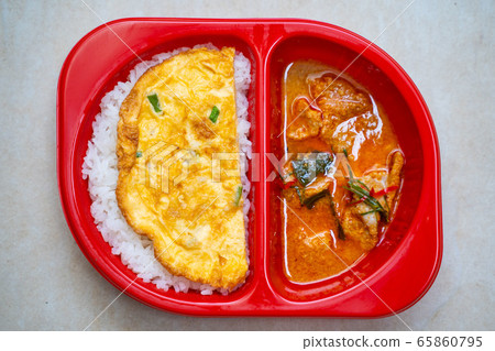 pork panaeng curry with rice and omelet pork panaeng curry with rice and omelet 65860795