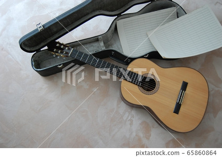Guitar, case and score 65860864