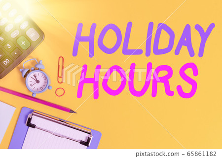 Text sign showing Holiday Hours. Conceptual photo Text sign showing Holiday Hours. Conceptual photo 65861182