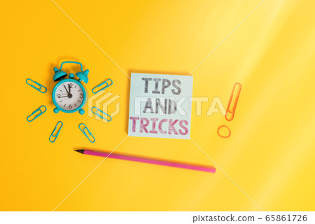 Writing note showing Tips And Tricks. Business Writing note showing Tips And Tricks. Business 65861726