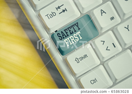 Word writing text Safety First. Business concept 65863028