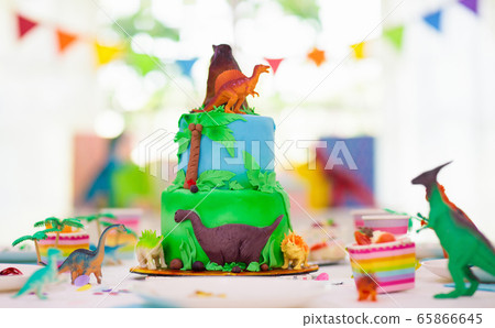 Kids birthday party. Dinosaur theme cake. Kids birthday party. Dinosaur theme cake. 65866645