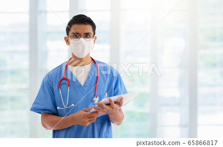 Doctor or nurse with stethoscope and face mask. 65866817